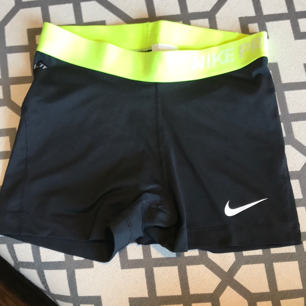 Nike Pro shorts in medium black and neon yellow